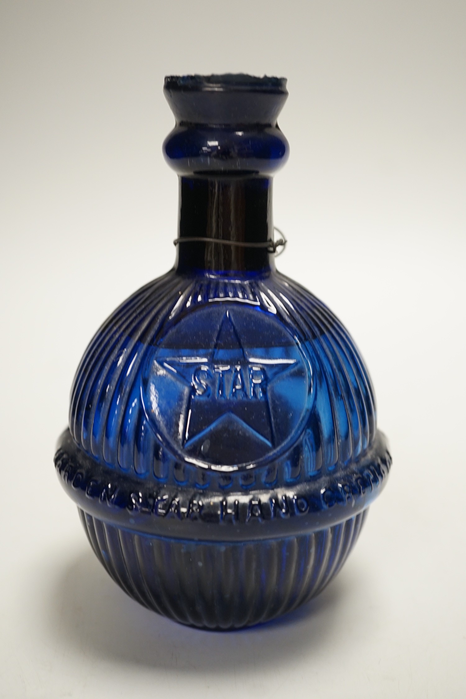 A Harden pressed glass water ‘hand grenade’. 17cm tall